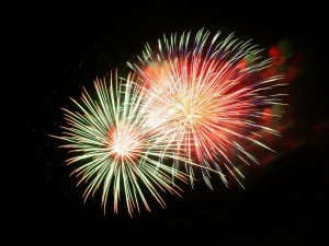 Red and green fireworks on July 4th at night 